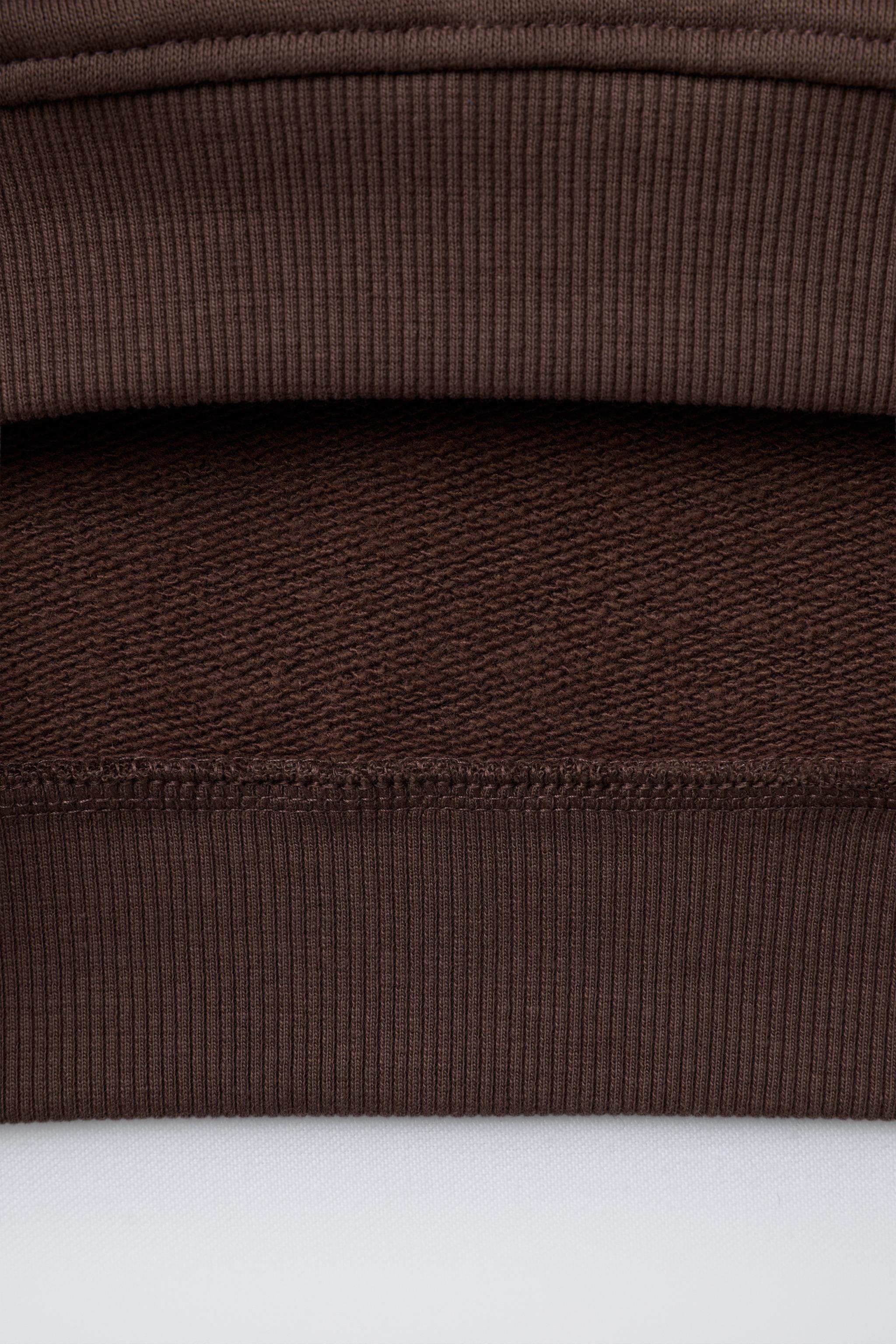 EMBROIDERED ANIMAL NUMBER SWEATSHIRT